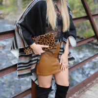 cape camel skirt otk boots styled by kasey