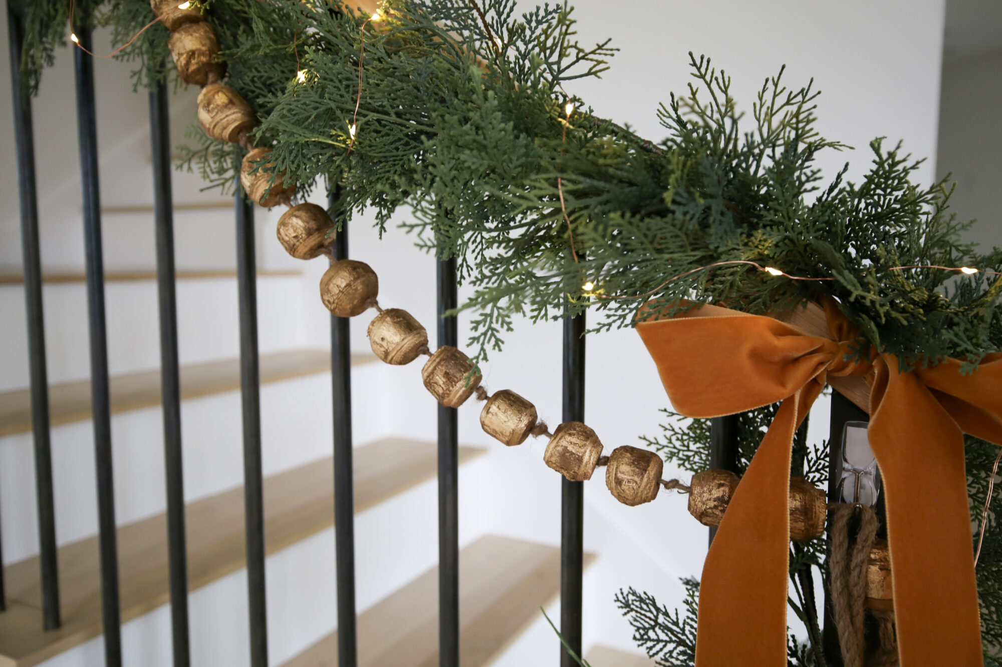 layering garland staircase christmas decor