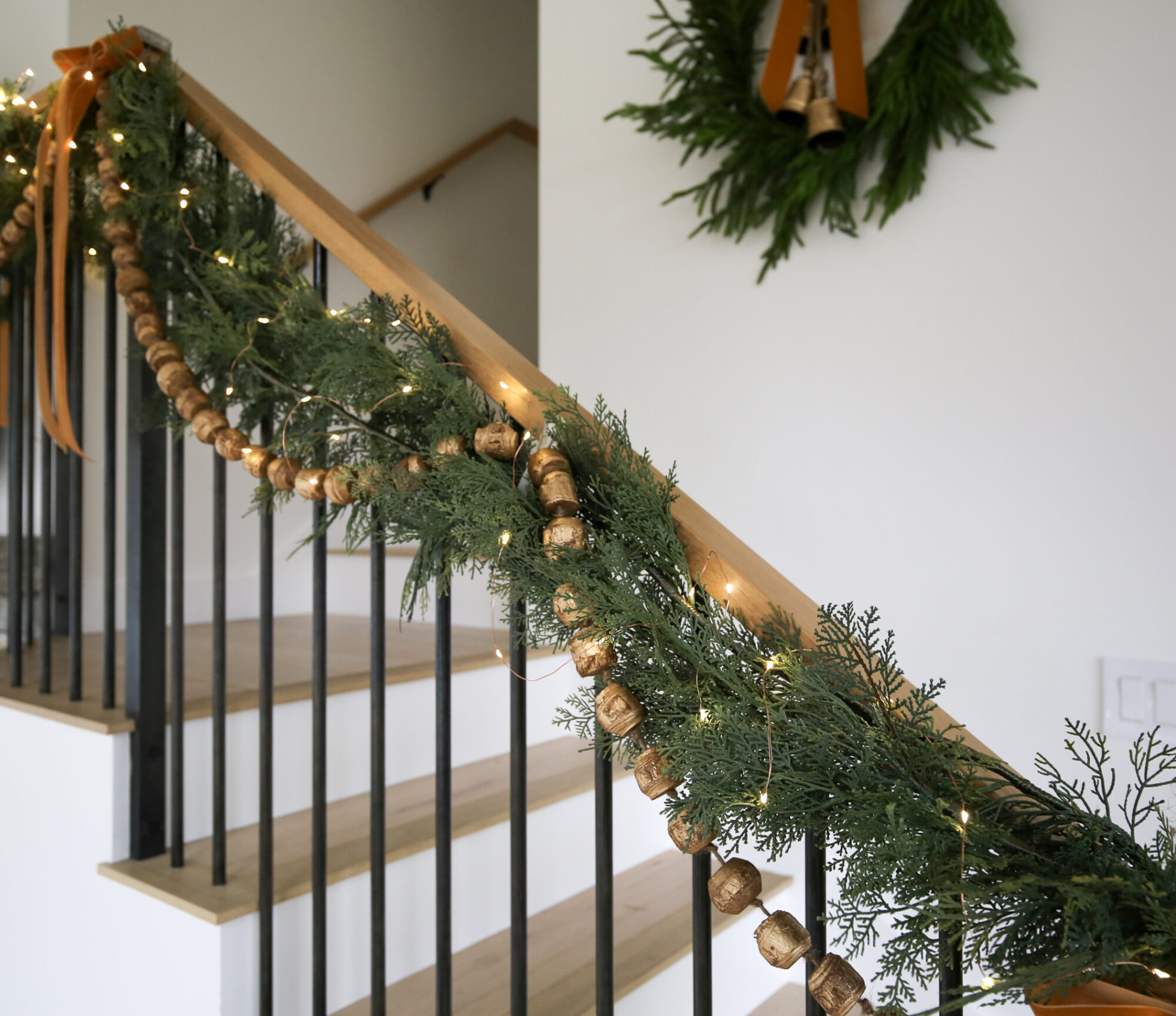 layering garland staircase christmas decor