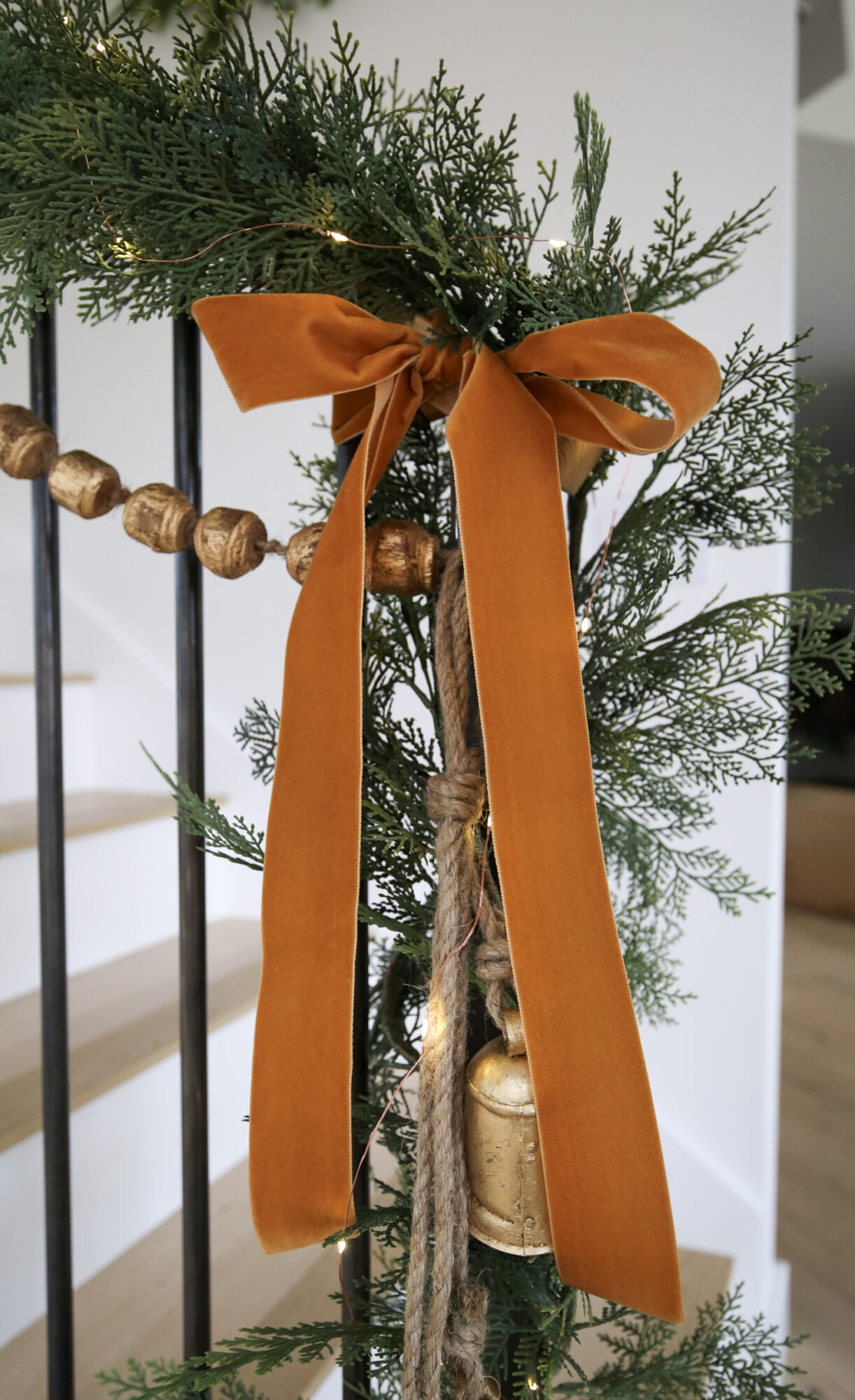 layering garland staircase christmas decor